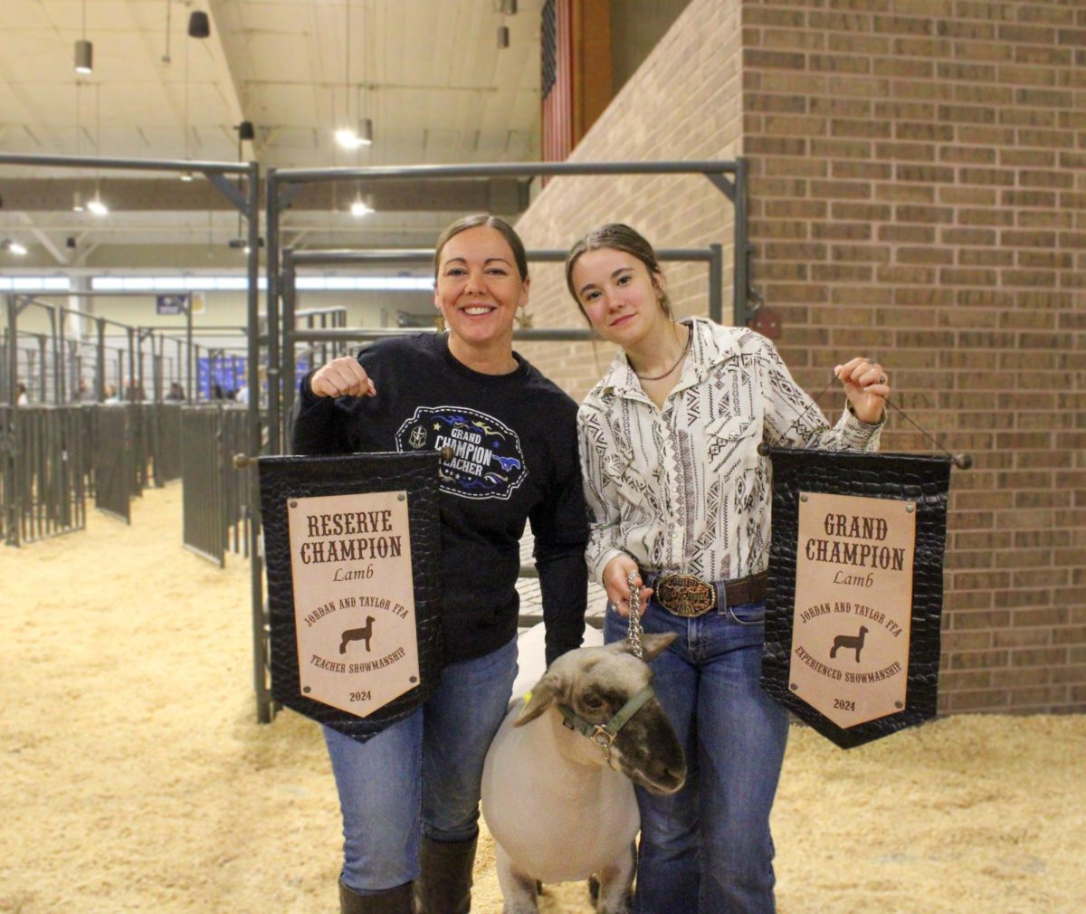 Ms Beckman & Lara Visser with their banners they earned.