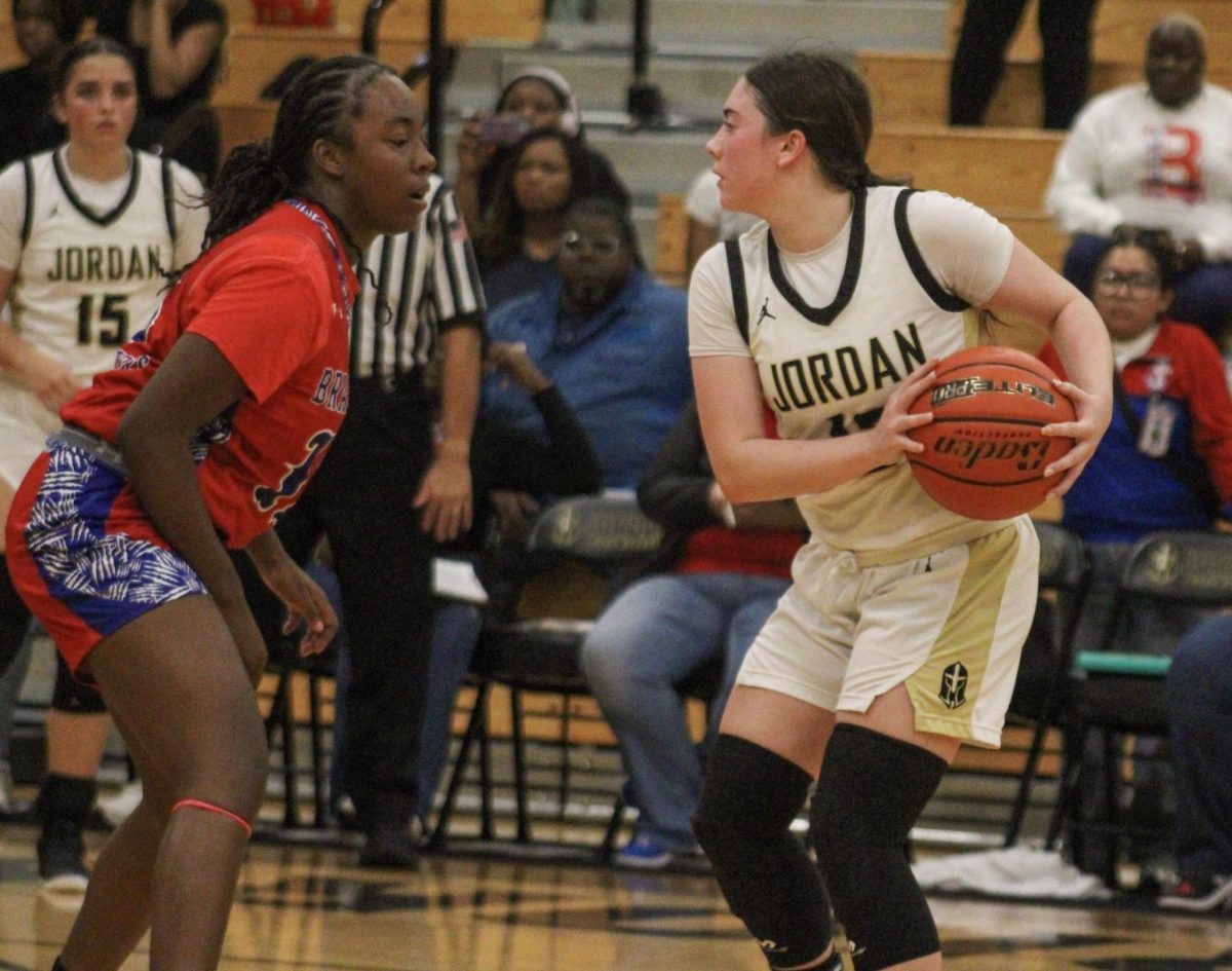 Senior Abigail Taylor squares up with a defender from Brazosport